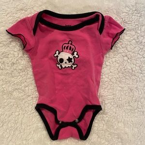 Pink onesie with skull and crown